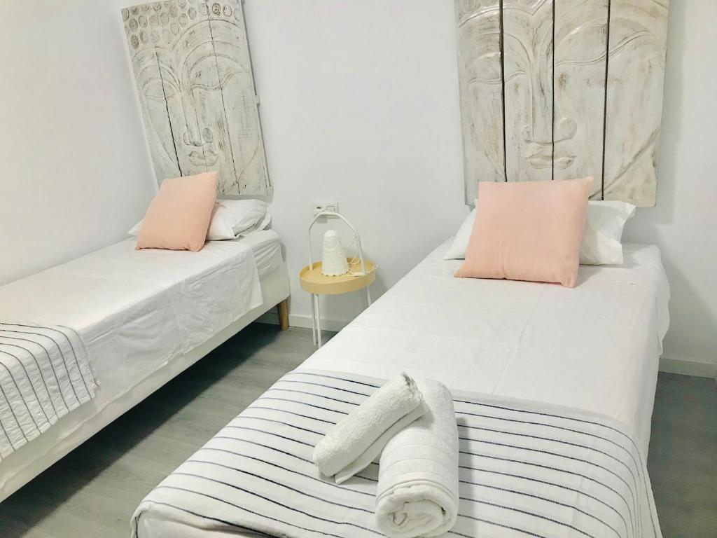 Posteľ alebo postele v izbe v ubytovaní Tabaiba SeaView
