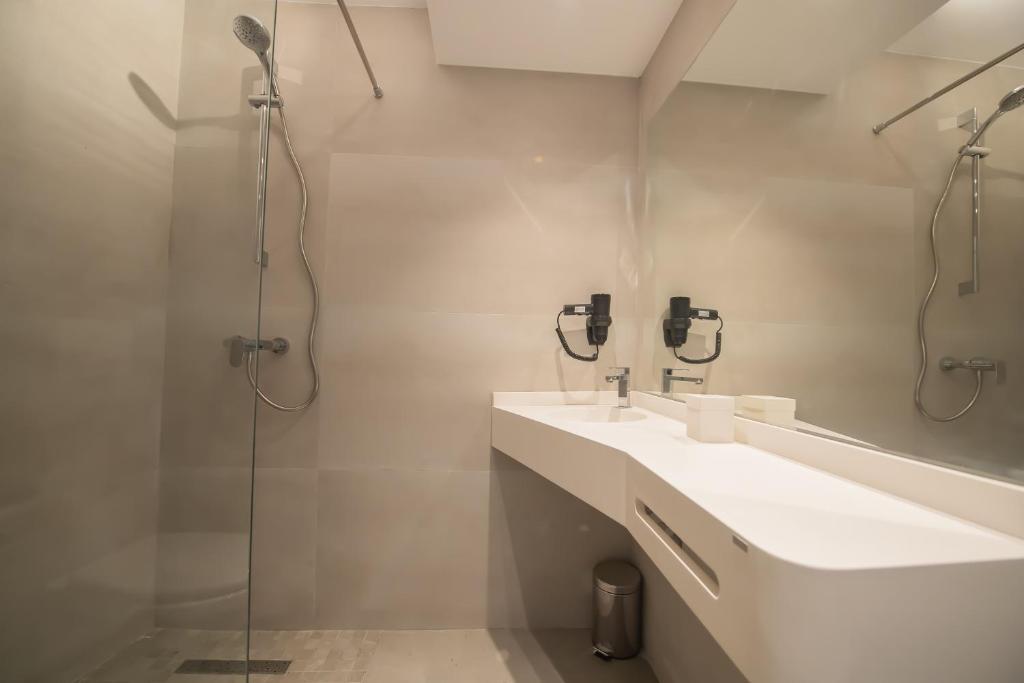 Koupelna v ubytování Hotel Atena***