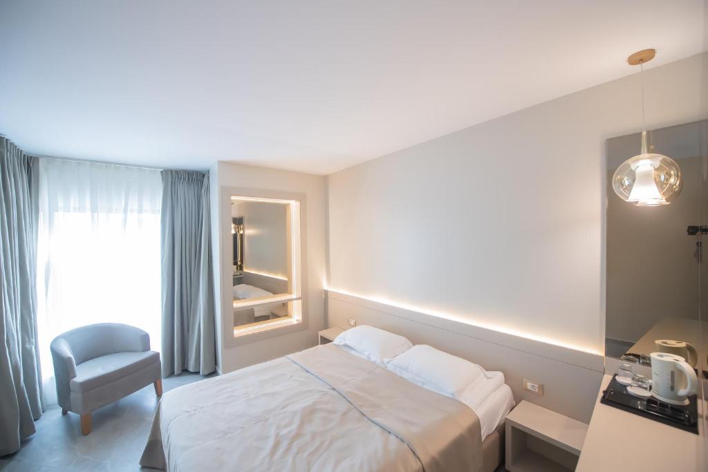 Postel nebo postele na pokoji v ubytování Hotel Atena***