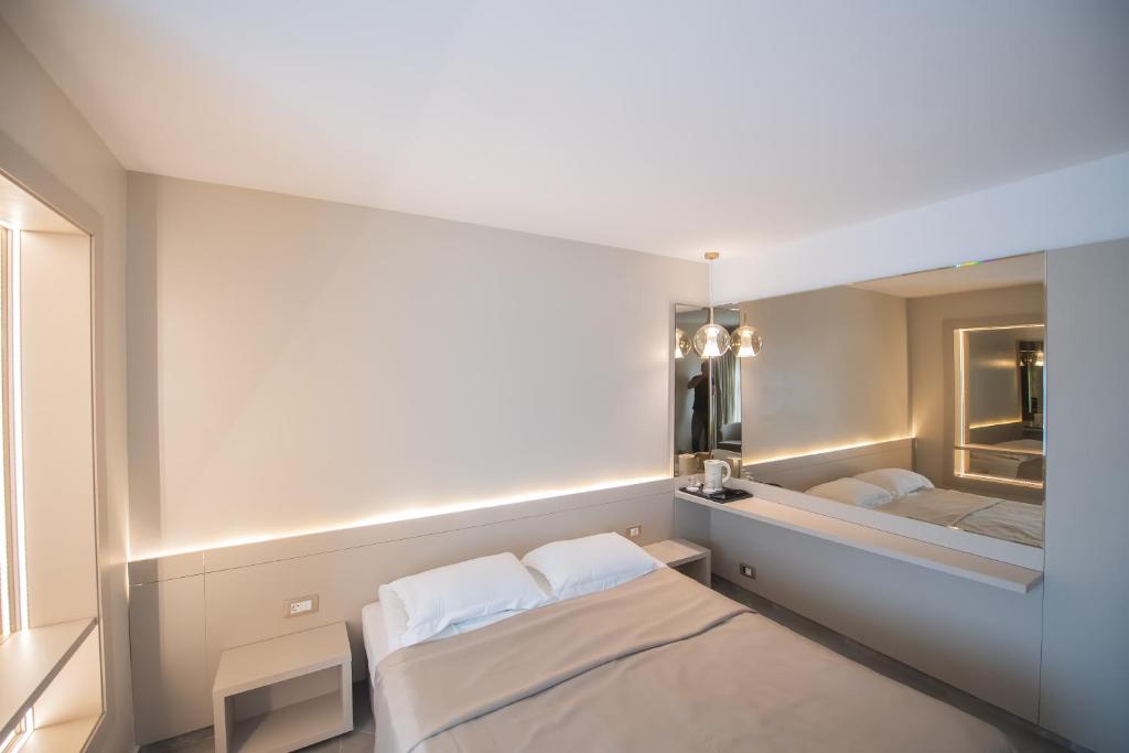 Postel nebo postele na pokoji v ubytování Hotel Atena***
