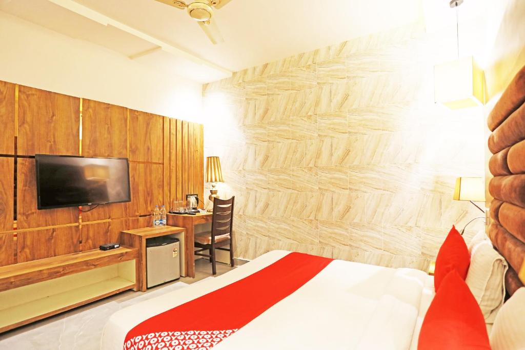 Krevet ili kreveti u jedinici u okviru objekta Super OYO Capital O 8902 Hotel Ronald Inn