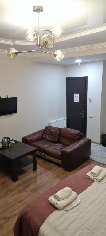 Postel nebo postele na pokoji v ubytování MAHALI HOTEL