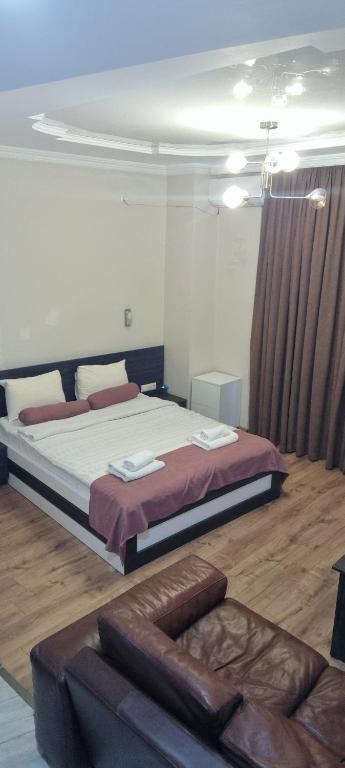 Postel nebo postele na pokoji v ubytování MAHALI HOTEL