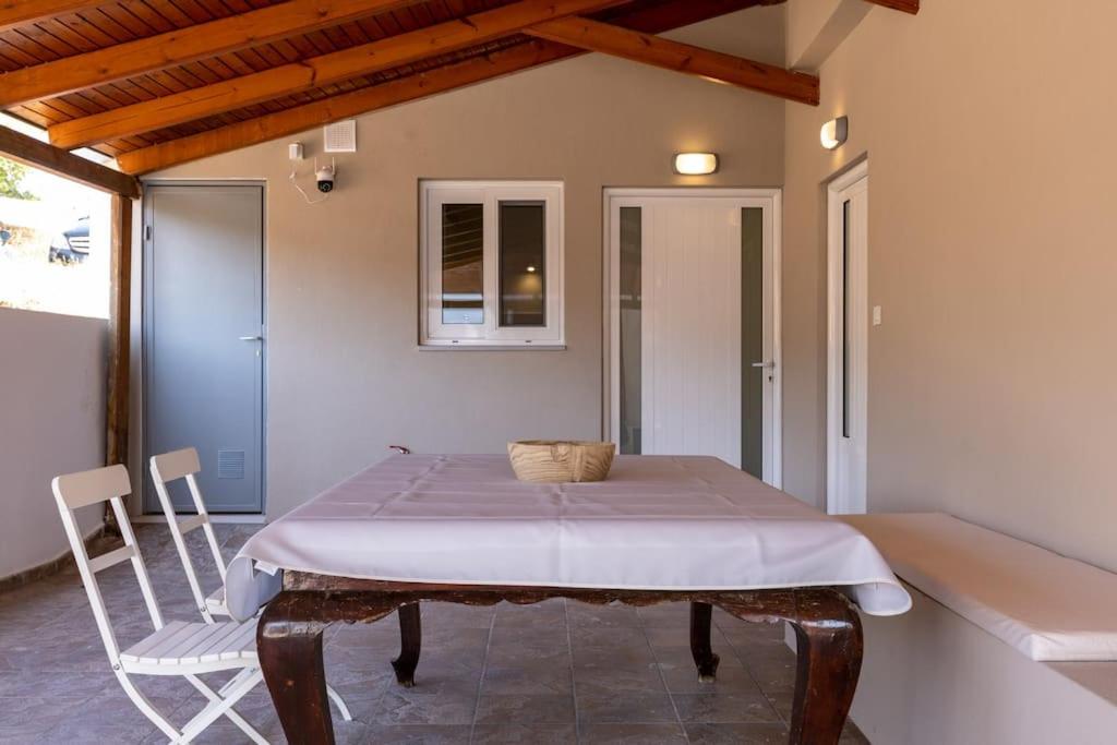 Posteľ alebo postele v izbe v ubytovaní Marianthi's Home
