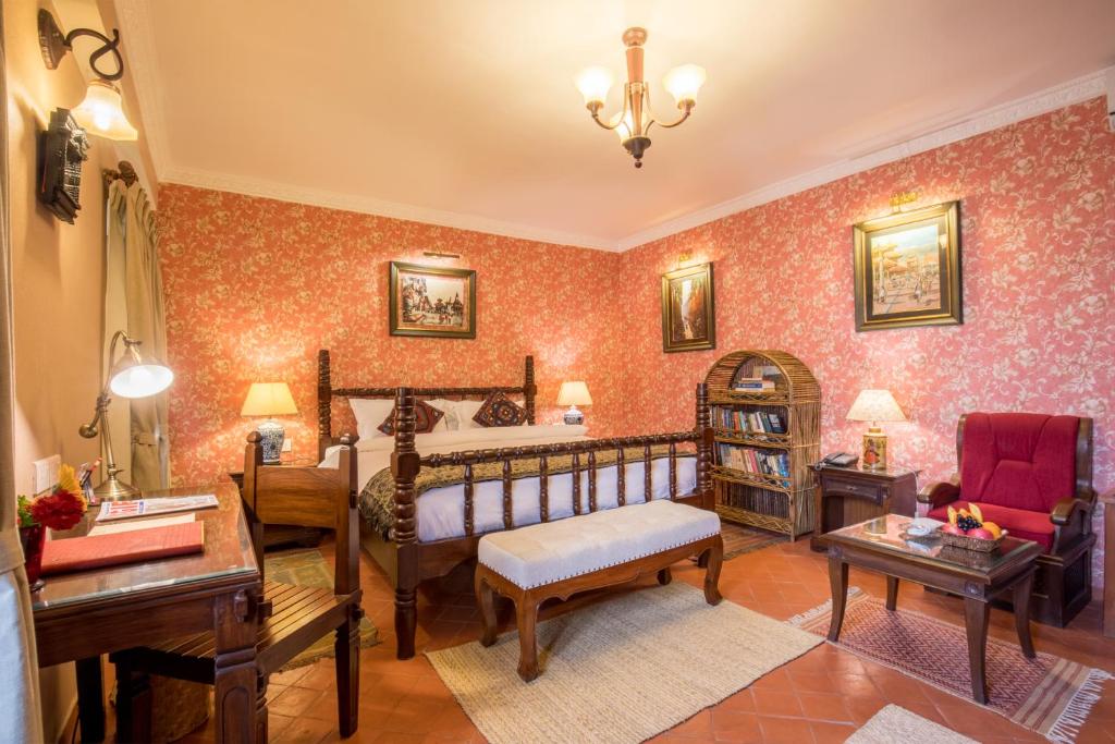 Postel nebo postele na pokoji v ubytování Baber Mahal Vilas - The Heritage Hotel
