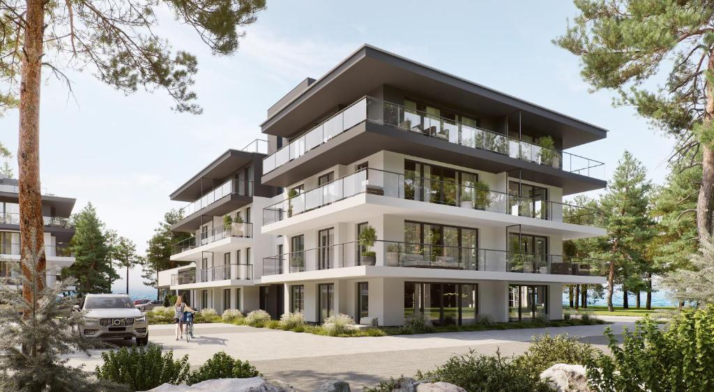 eine architektonische Darstellung eines Apartmenthauses in der Unterkunft HEVENIA POGORZELICA - APARTAMENT 1 in Pogorzelica