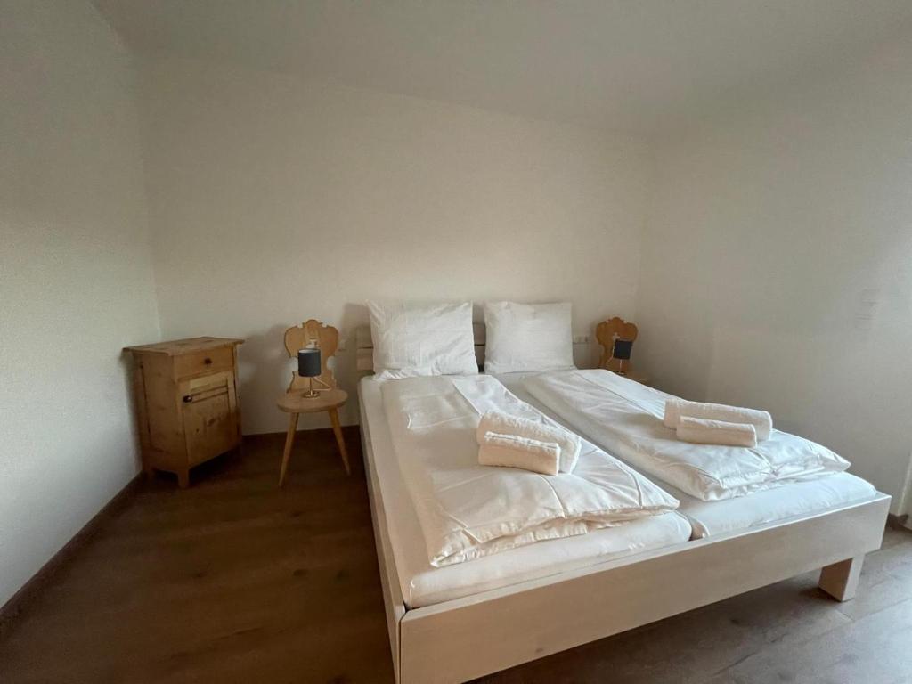 Postel nebo postele na pokoji v ubytování Ferienhaus am Weinberg Krast