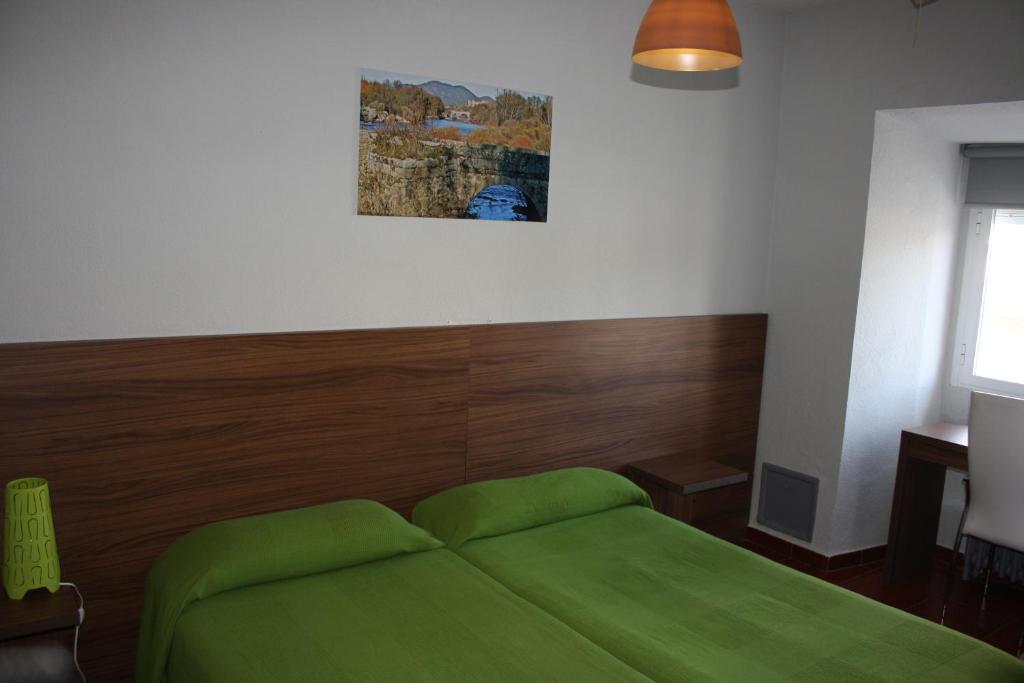 Postel nebo postele na pokoji v ubytování Hostal La Estación
