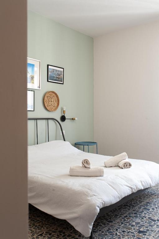 Postel nebo postele na pokoji v ubytování Four Rooms Alghero