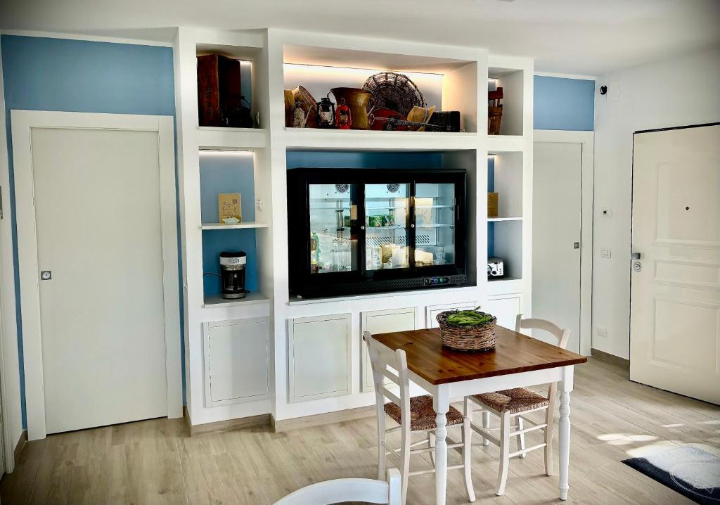 TV a/nebo společenská místnost v ubytování Borgo Incoronata B&B