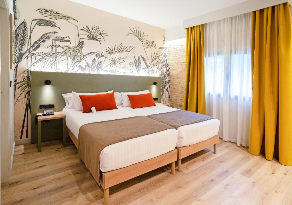 Postel nebo postele na pokoji v ubytování DWO Valencia