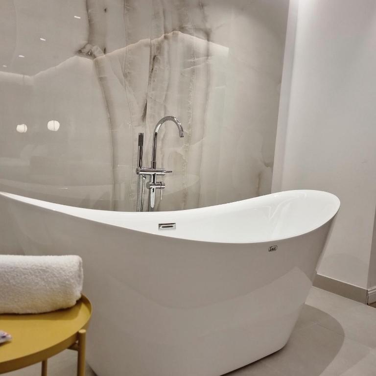 Koupelna v ubytování Perla Hotel