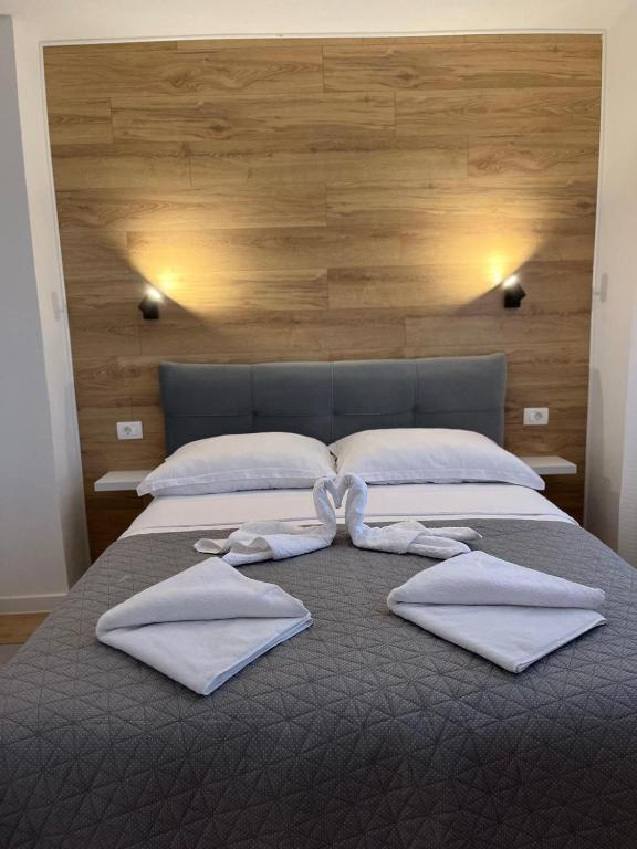 Postel nebo postele na pokoji v ubytování Apartman TeNeN