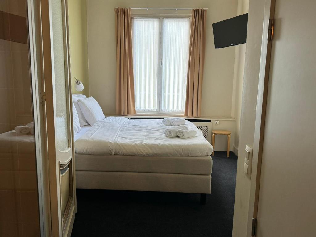 Postel nebo postele na pokoji v ubytování Hotel Rubenshof