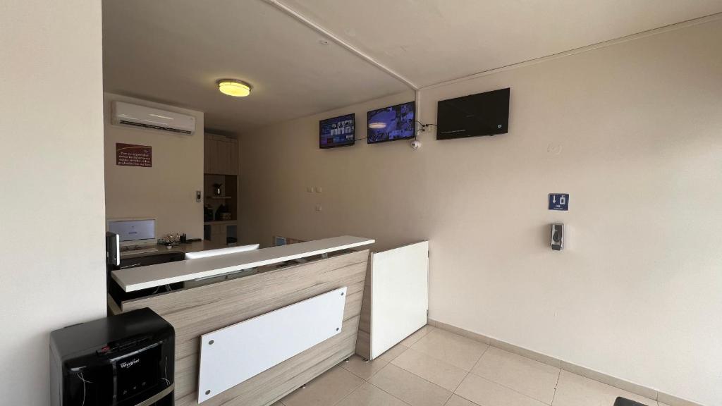 Kuchyň nebo kuchyňský kout v ubytování Nova Hotel