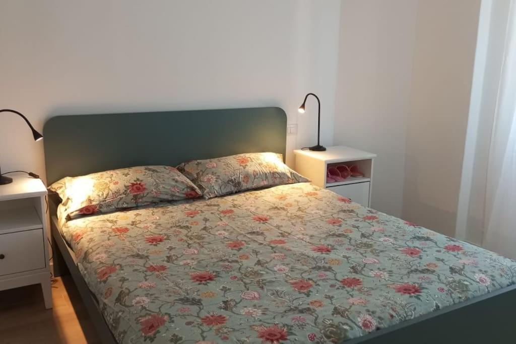 Postel nebo postele na pokoji v ubytování Casa Prospettiva Verde, tra natura e città