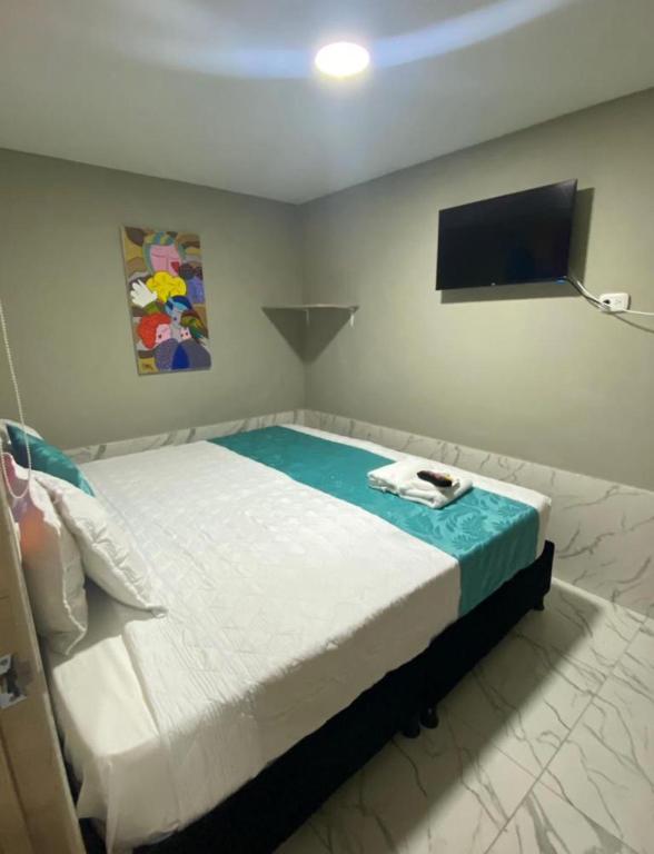 Postel nebo postele na pokoji v ubytování HOTEL LUXEM