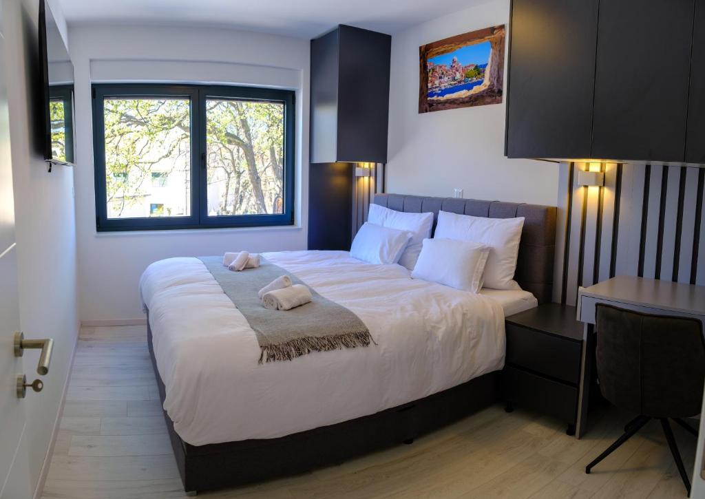 Postel nebo postele na pokoji v ubytování Premium Holiday house VILA OAZA with Pool