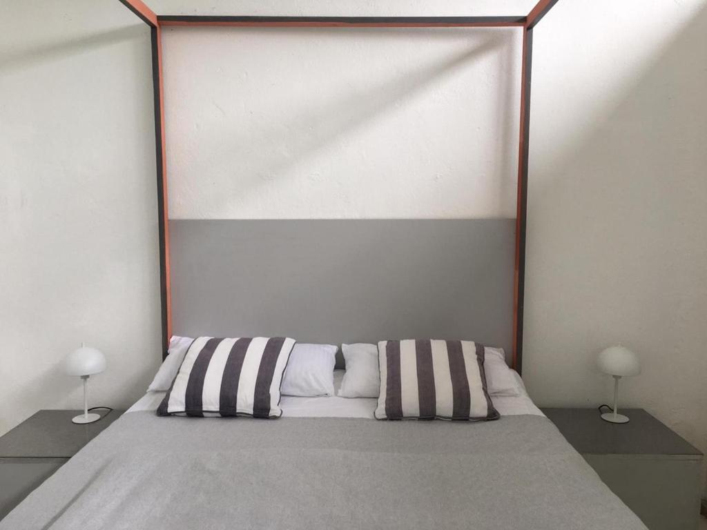 Кровать или кровати в номере Ferienwohnung Teehaus