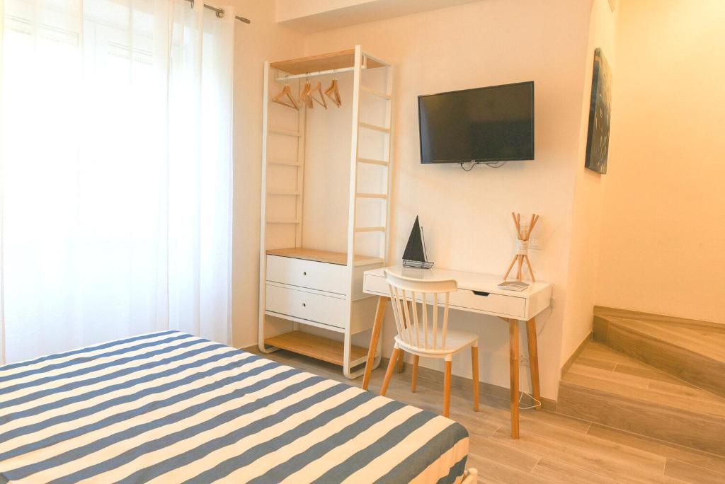 TV a/nebo společenská místnost v ubytování Bed and Breakfast La Vela