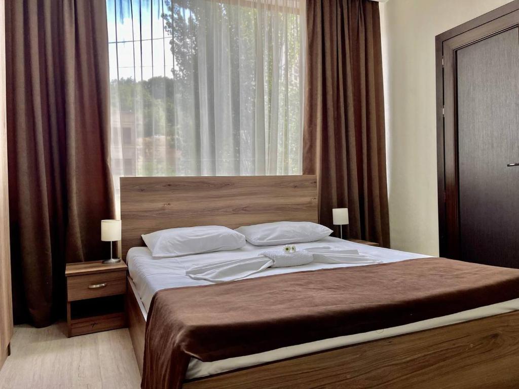Postel nebo postele na pokoji v ubytování Merien hotel