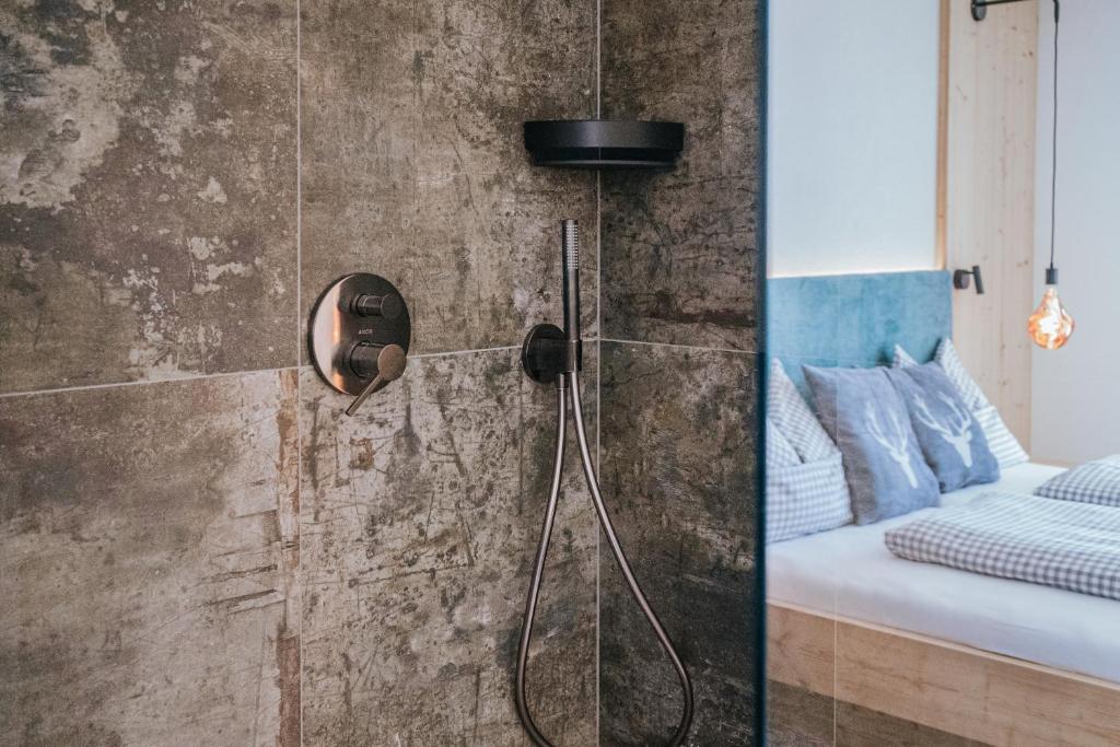 Postel nebo postele na pokoji v ubytování Chalets Hansleitner