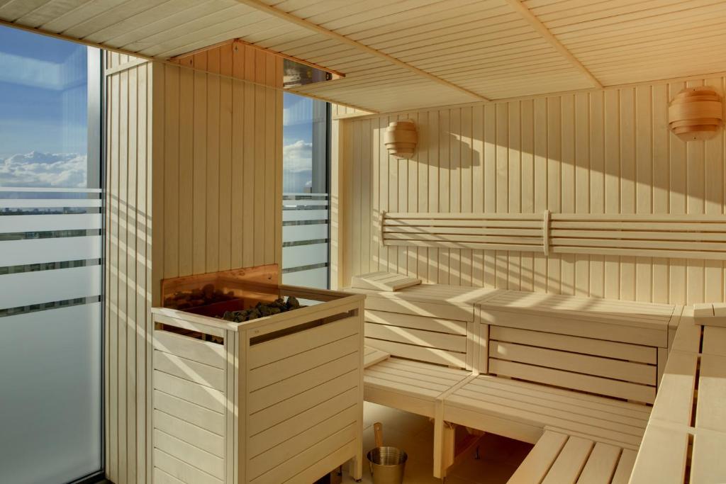 a sauna with a view of the ocean at Steigenberger Hotel Bremen in Bremen
