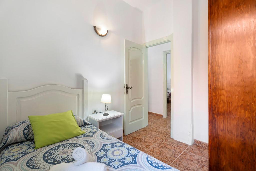 Łóżko lub łóżka w pokoju w obiekcie Casa Rural Paula By Paramount Holidays