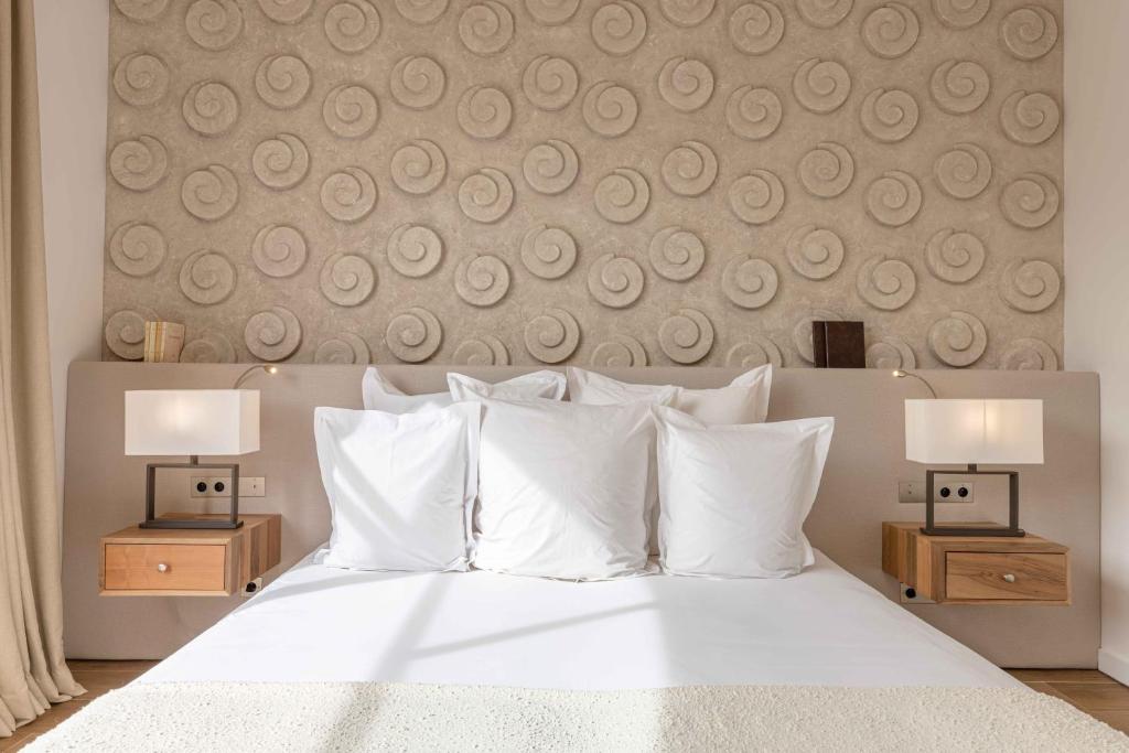 Postel nebo postele na pokoji v ubytování Ksar Char-Bagh Small Luxury Hotels