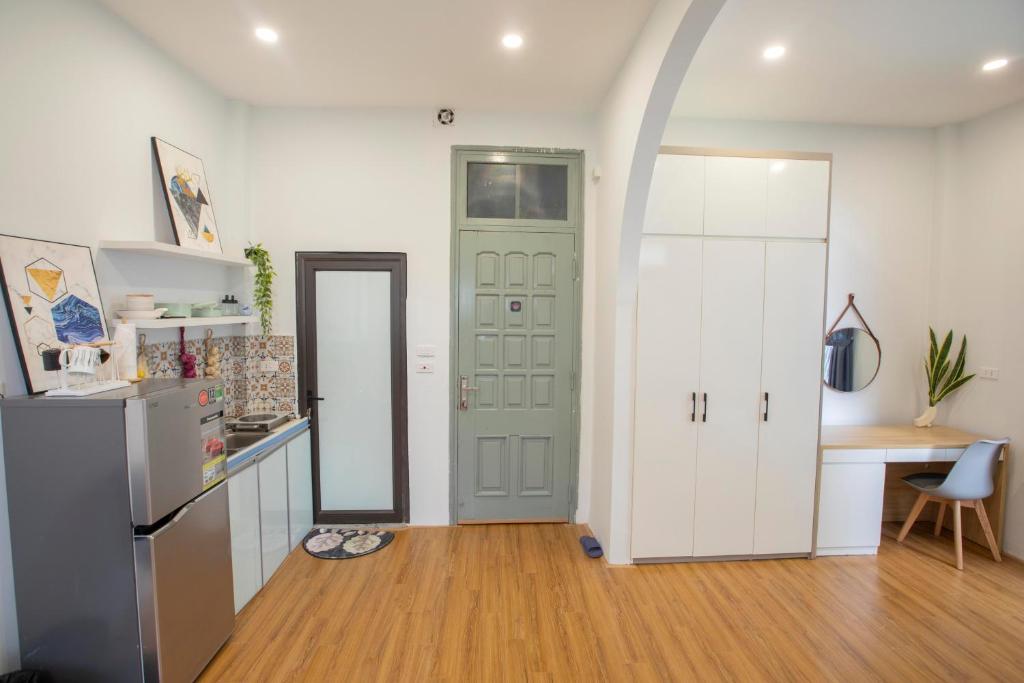 Kuchyň nebo kuchyňský kout v ubytování Sushi House Van Mieu 402