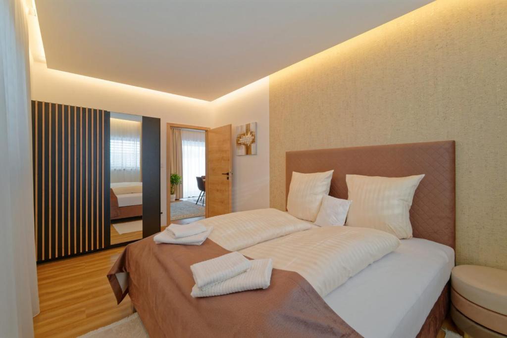 Postel nebo postele na pokoji v ubytování Villa Holiday Hevlín