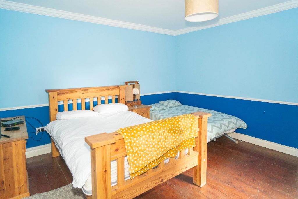 Postel nebo postele na pokoji v ubytování Willsgrove House