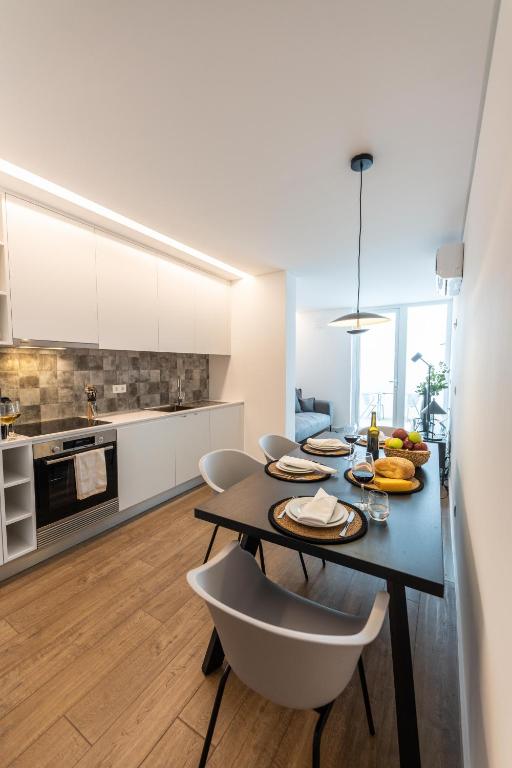 Kuchyň nebo kuchyňský kout v ubytování Brum Design Apartments I