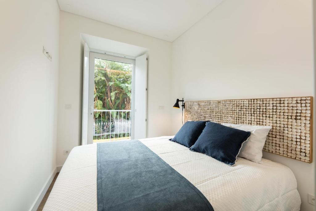 Postel nebo postele na pokoji v ubytování Brum Design Apartments I