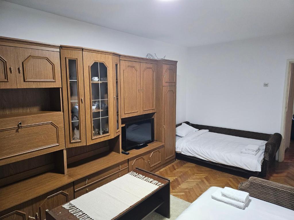 Postel nebo postele na pokoji v ubytování Apartman NINA