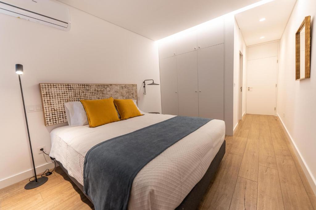 Postel nebo postele na pokoji v ubytování Brum Design Apartments I