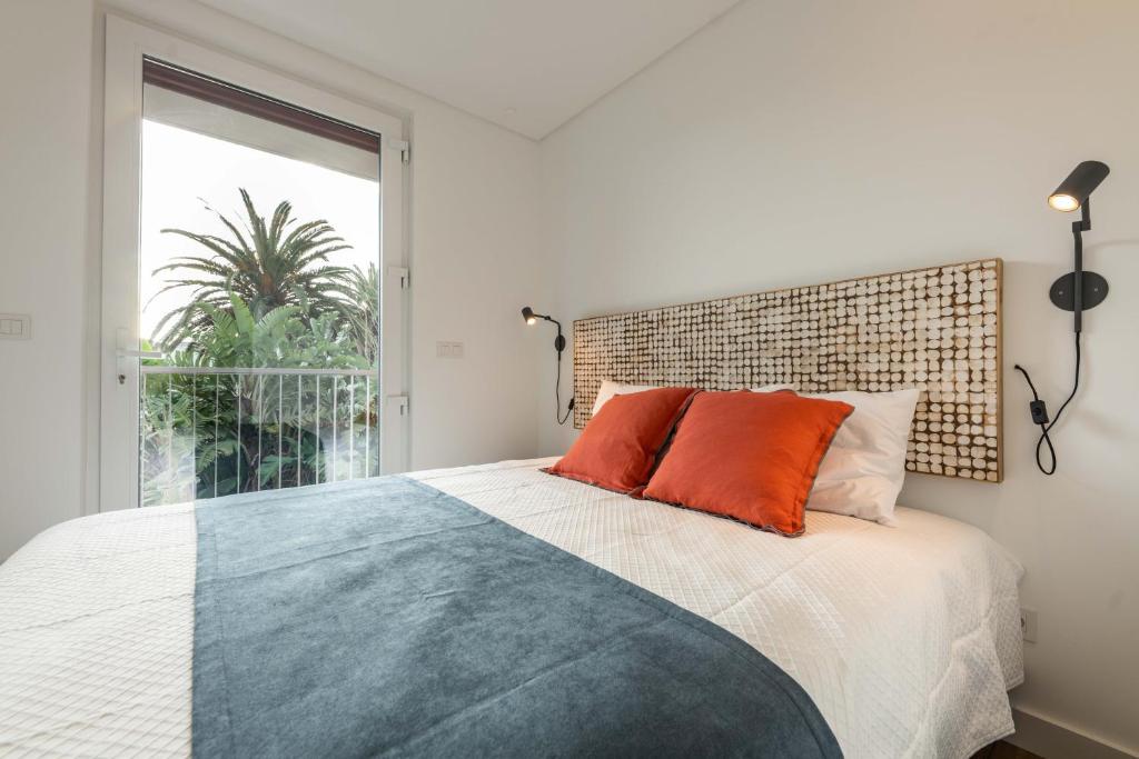 Postel nebo postele na pokoji v ubytování Brum Design Apartments I