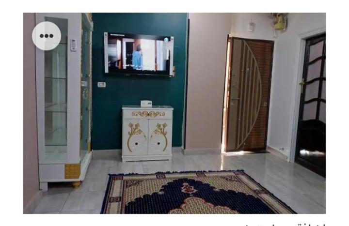 TV a/nebo společenská místnost v ubytování Amira Hospitality House