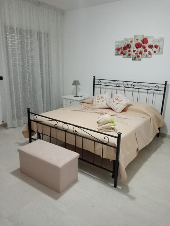 Ένα ή περισσότερα κρεβάτια σε δωμάτιο στο Casa Vacanza Luna2