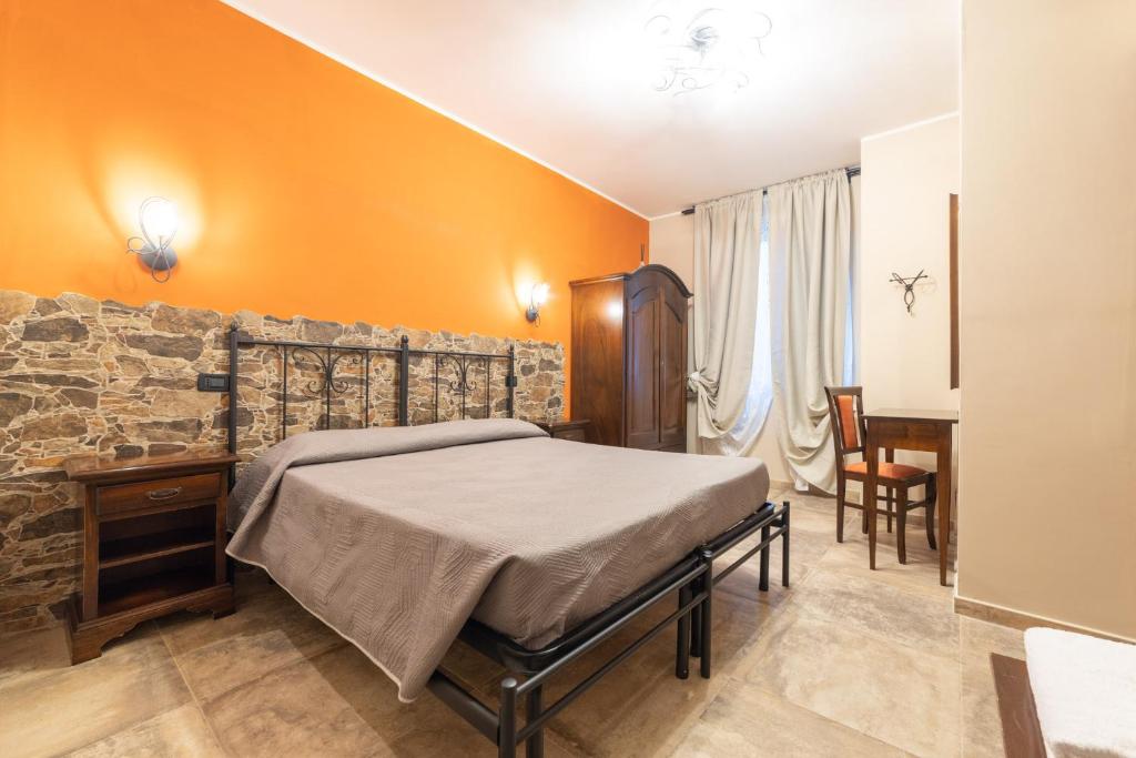 Łóżko lub łóżka w pokoju w obiekcie Agriturismo Parco delle Querce