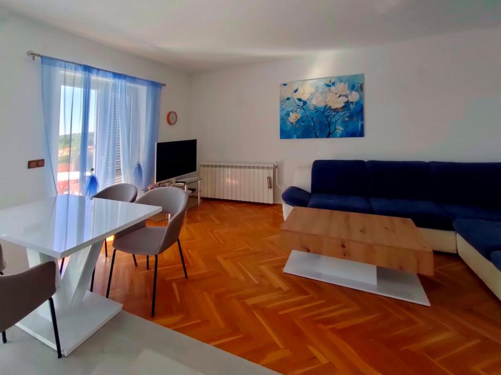 TV a/nebo společenská místnost v ubytování Skajla Apartments