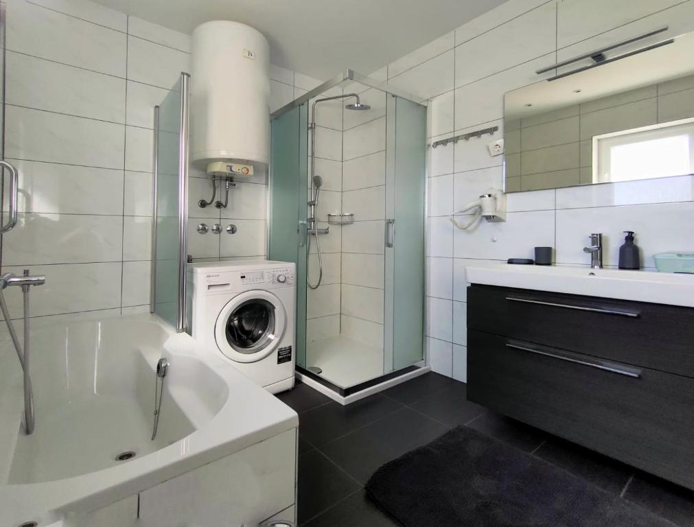 Koupelna v ubytování Skajla Apartments