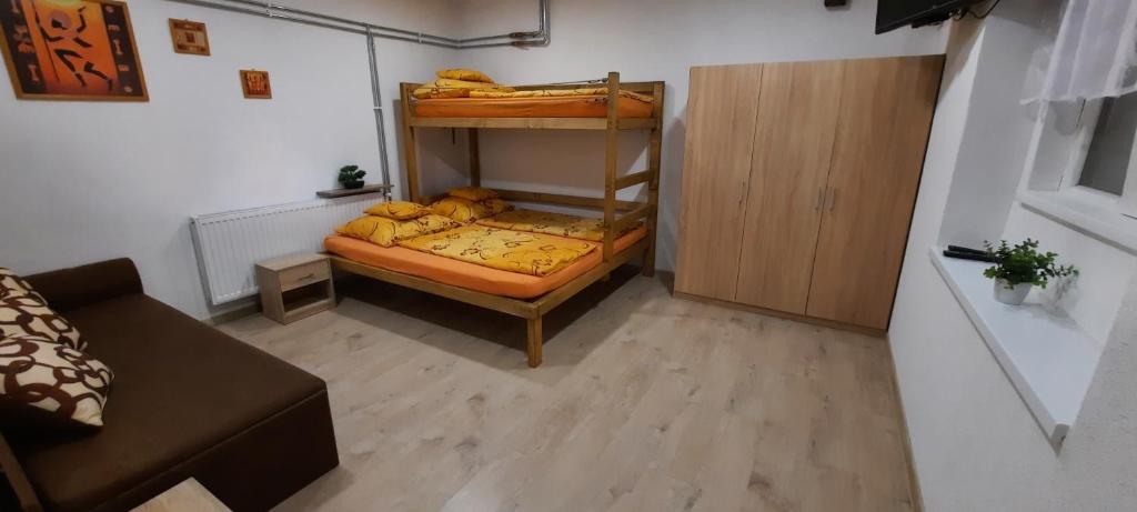 Postel nebo postele na pokoji v ubytování Vejminek pod smrkem