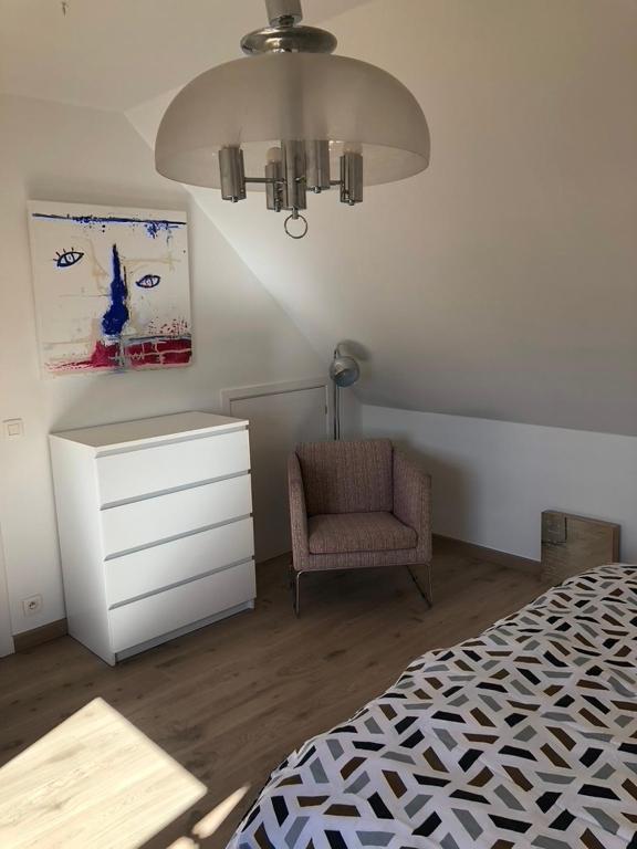 Postel nebo postele na pokoji v ubytování Repos du Cocher
