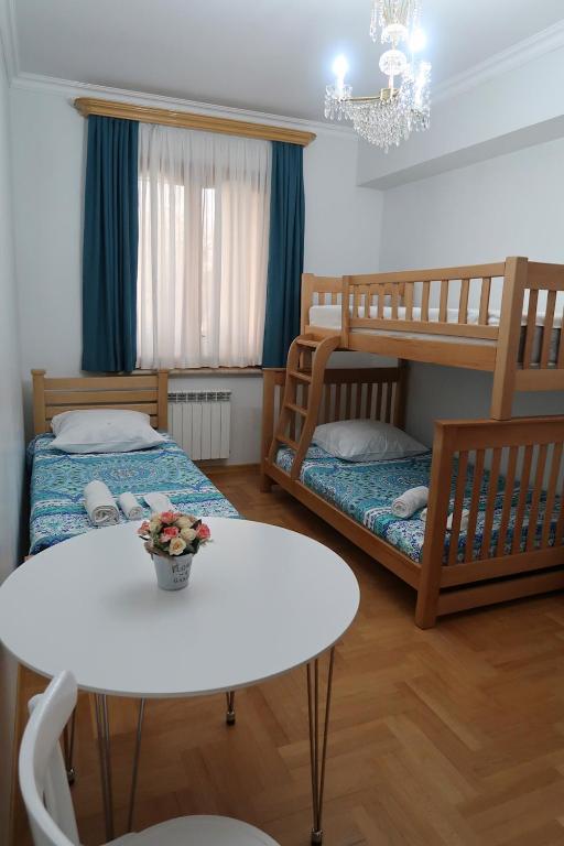 Postel nebo postele na pokoji v ubytování guest house Merci