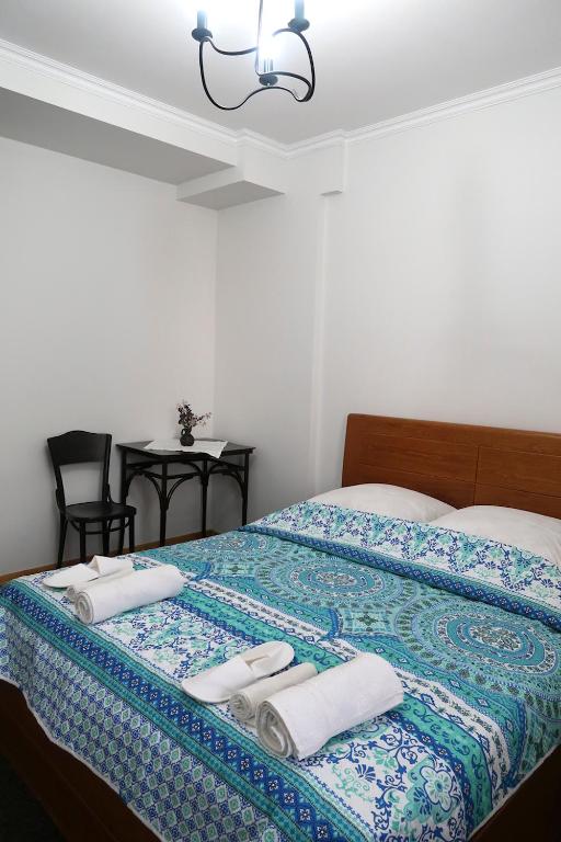 Postel nebo postele na pokoji v ubytování guest house Merci