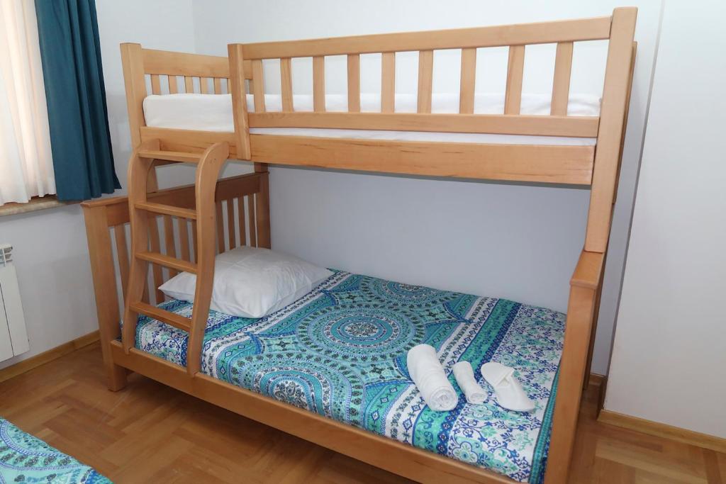 Postel nebo postele na pokoji v ubytování guest house Merci
