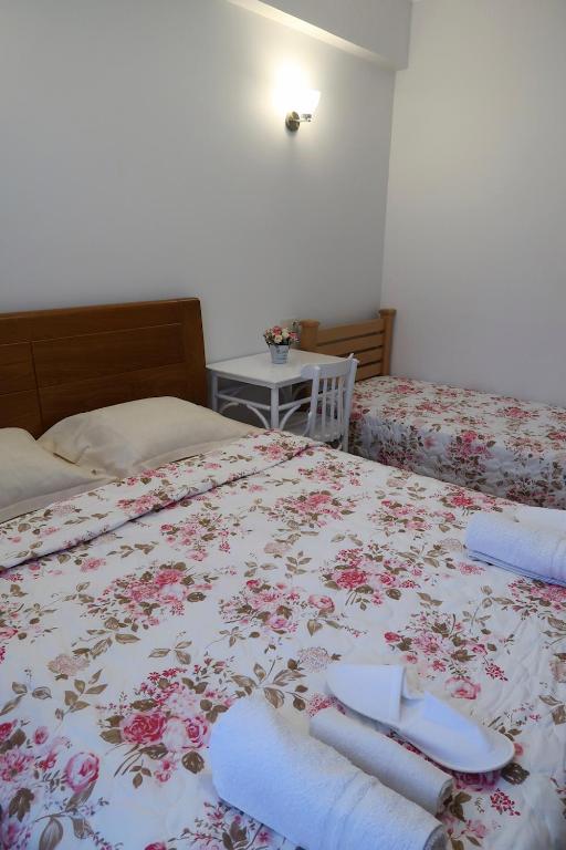 Postel nebo postele na pokoji v ubytování guest house Merci