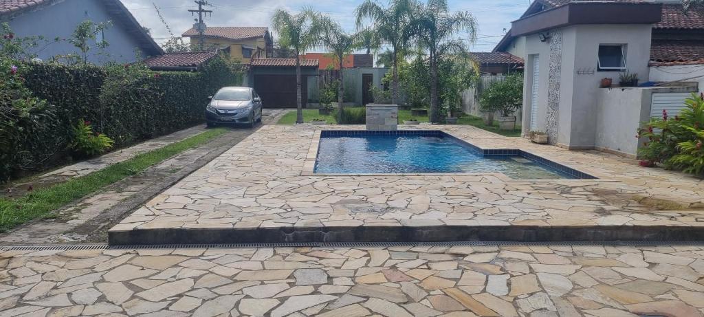 Swimmingpoolen hos eller tæt på Casa Cibratel 2 Itanhaém