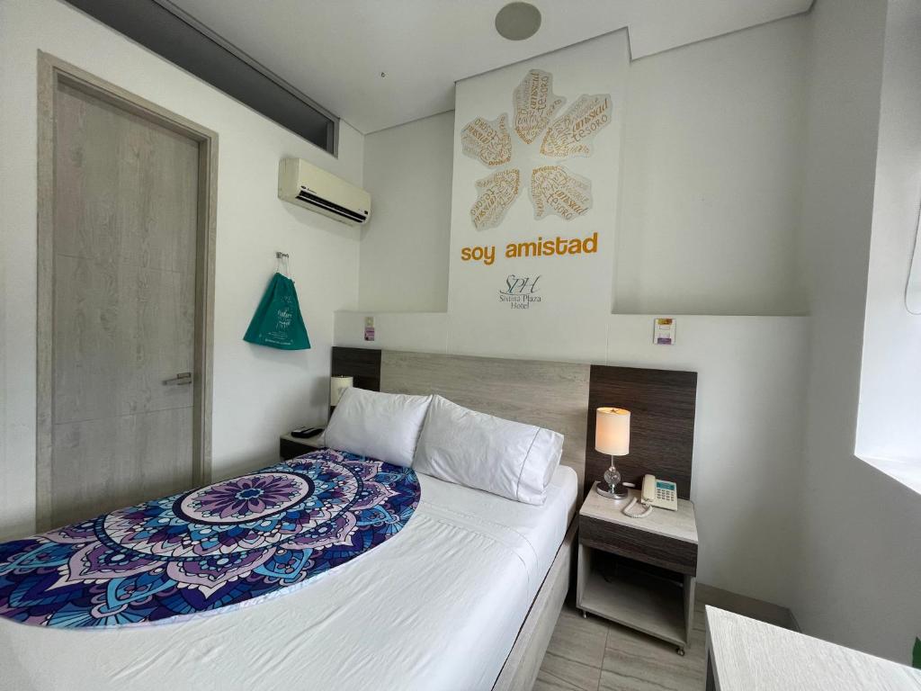 Postel nebo postele na pokoji v ubytování Hotel Sixtina Plaza Medellin